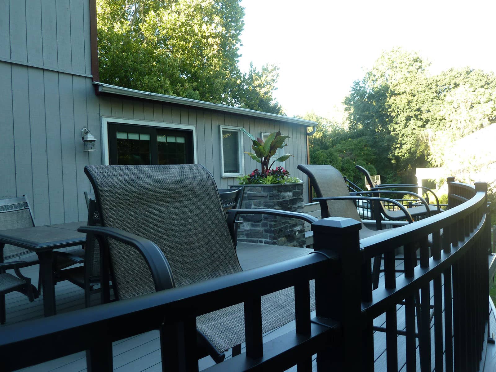 We designed and installed a custom curve to this deck to give the space much appreciated visual interest.