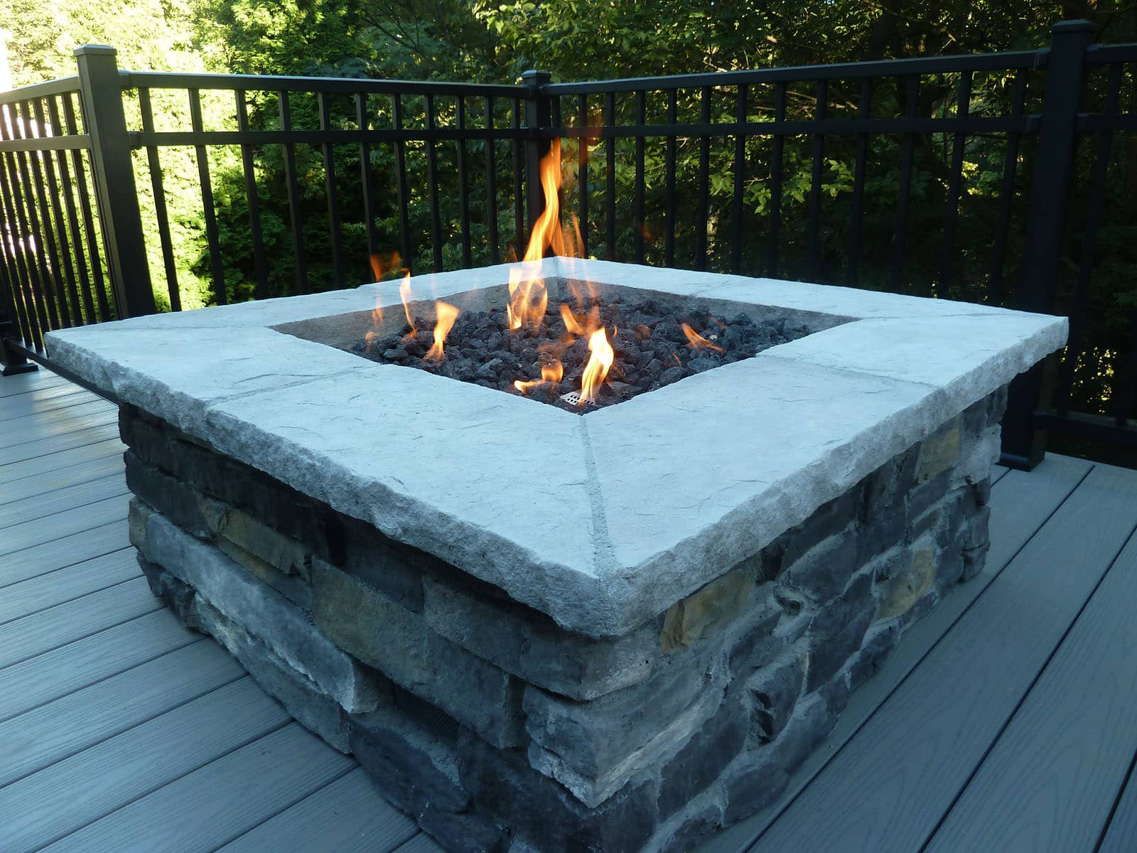 This gas firepit creates the perfect place to kick back and relax after a long day.