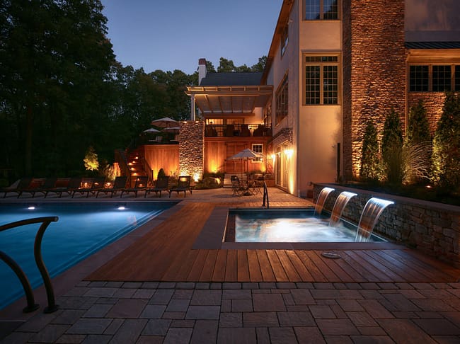 Well placed landscape lighting can help avoid dangerous trips, falls, or other accidents that could occur in a dark backyard.