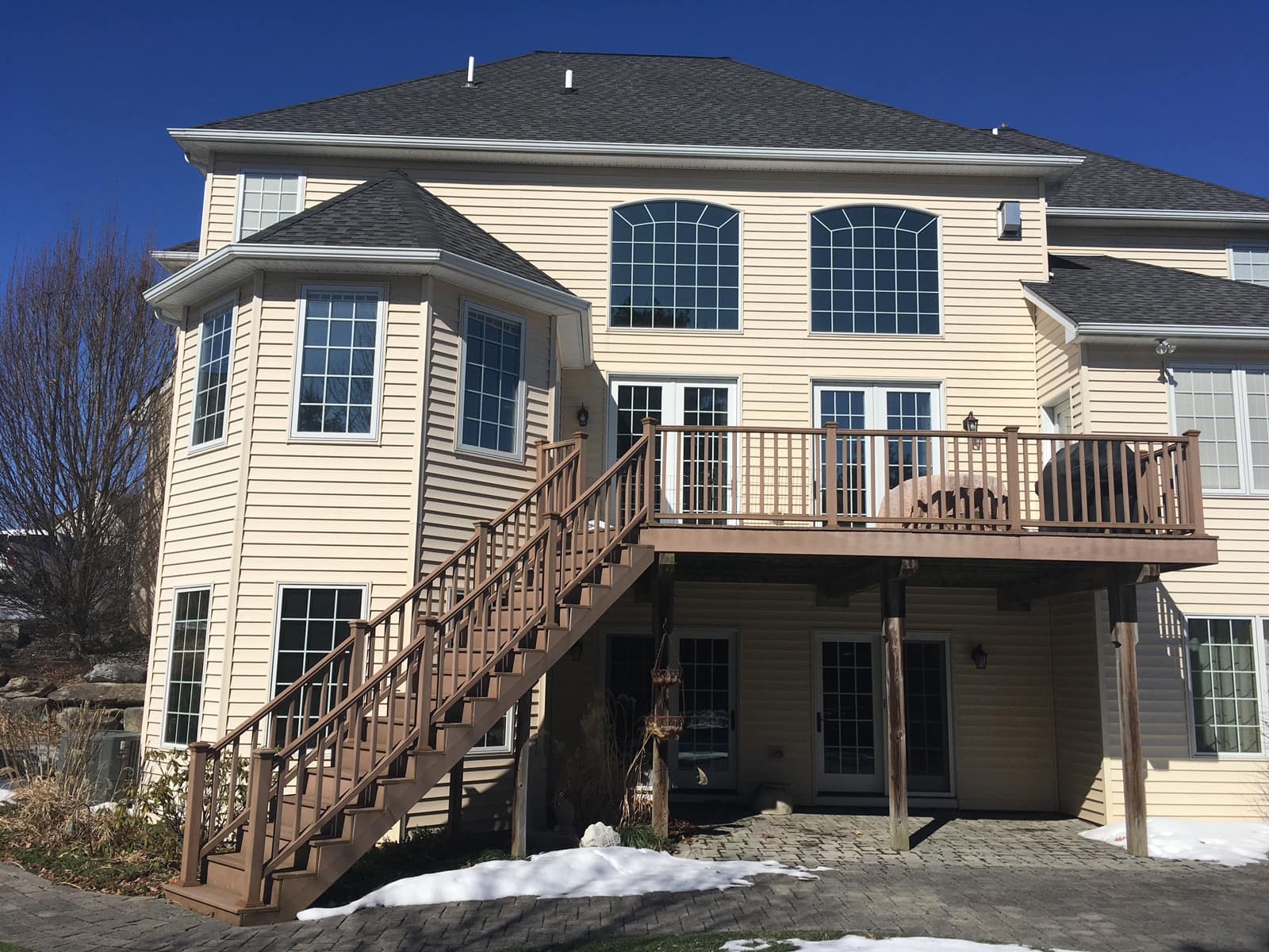 This first generation Trex deck has seen better days! The homeowner reached out to MasterPLAN to reimagine the space to include several fun features!