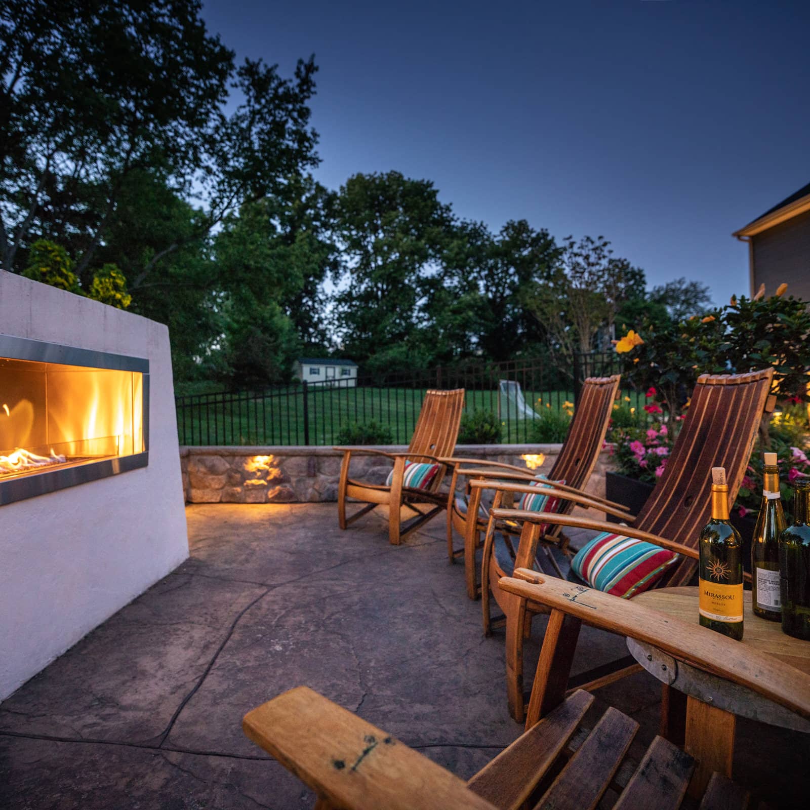 Chilly evenings have never felt so cozy and relaxing! This custom fireplace is a favorite backyard destination for this Royersford family.