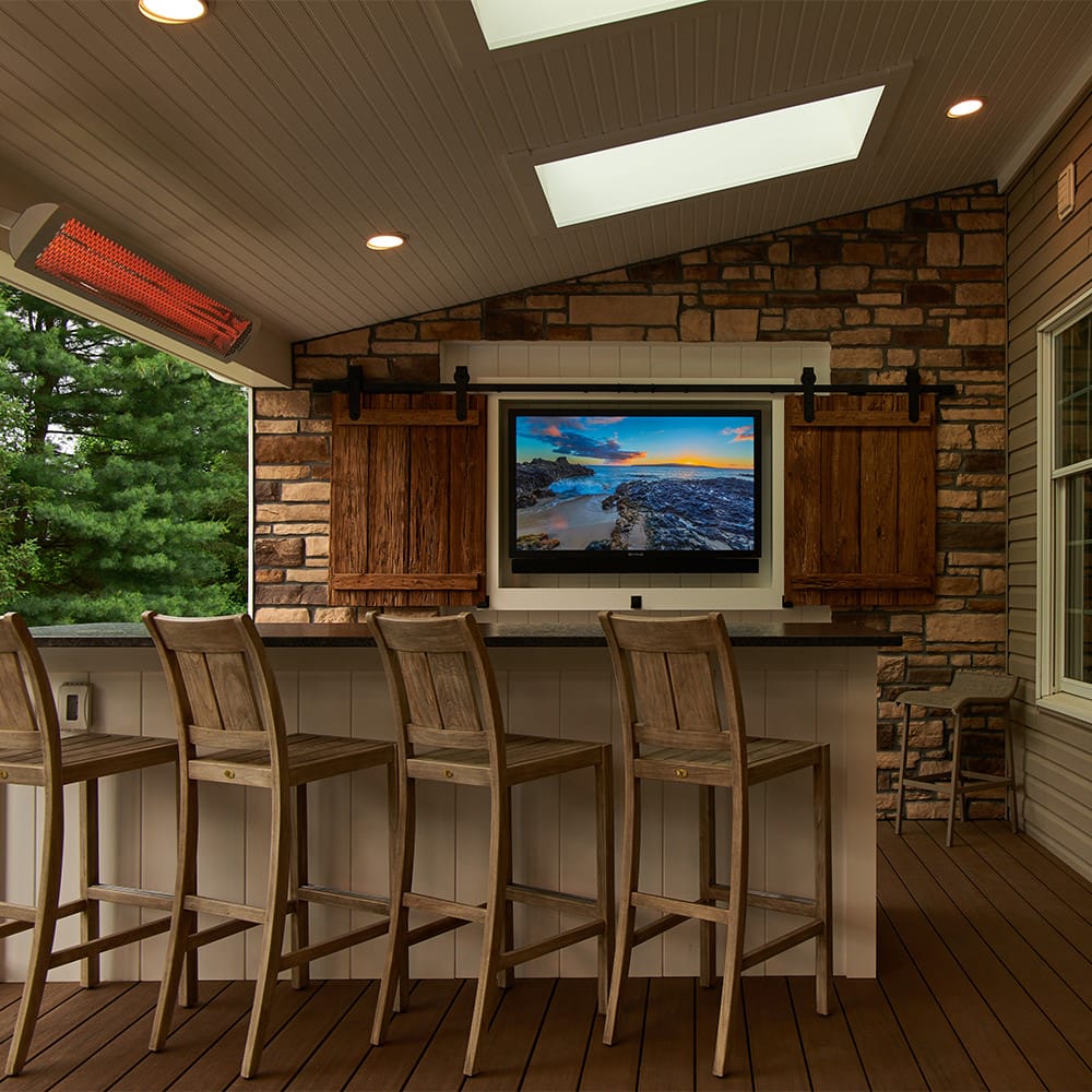 Creature comforts like this infrared Bromic heater allow this family to enjoy their outdoor space for an additional 4 months out of the year!