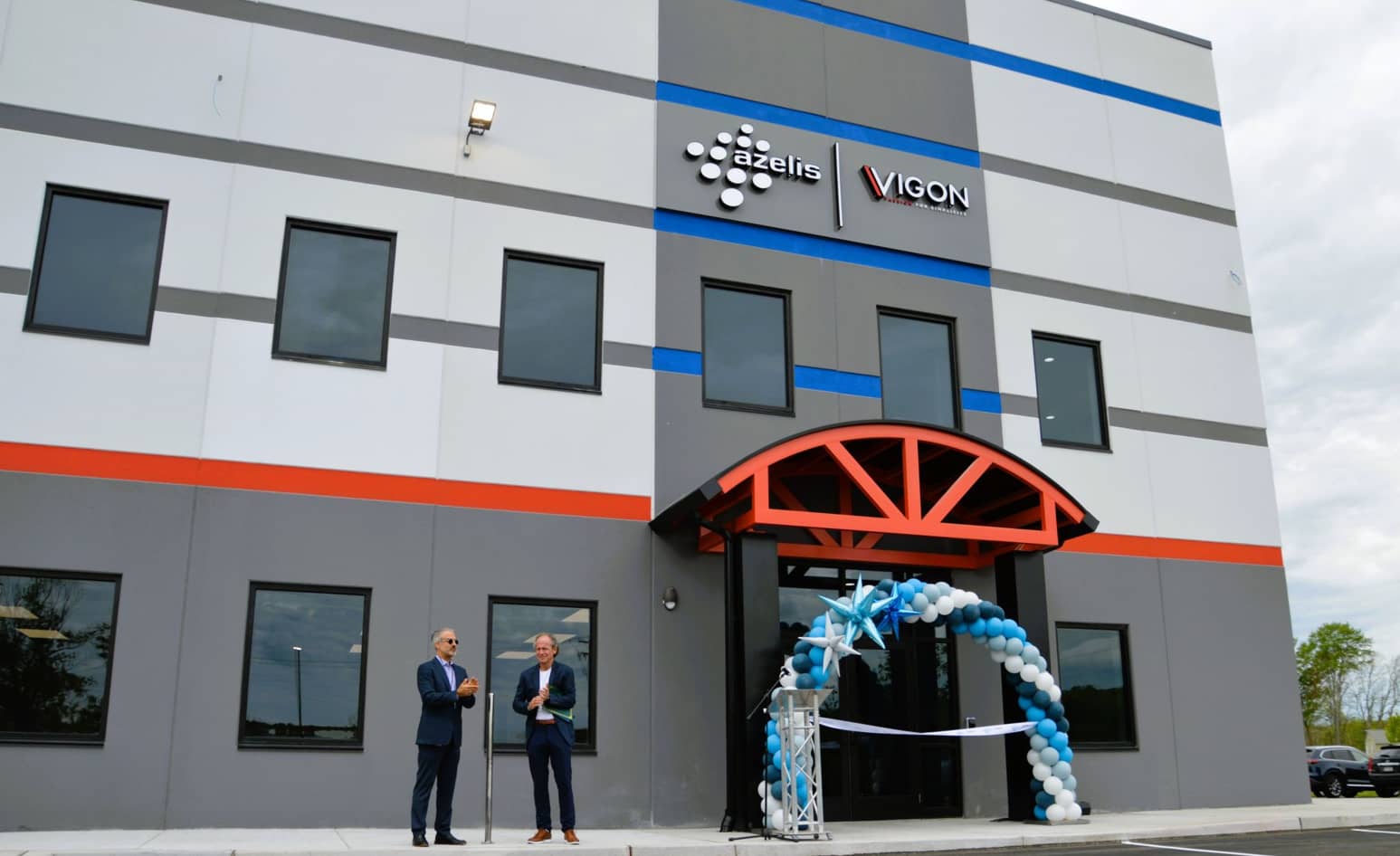 http://Vigon%20ribbon%20cutting