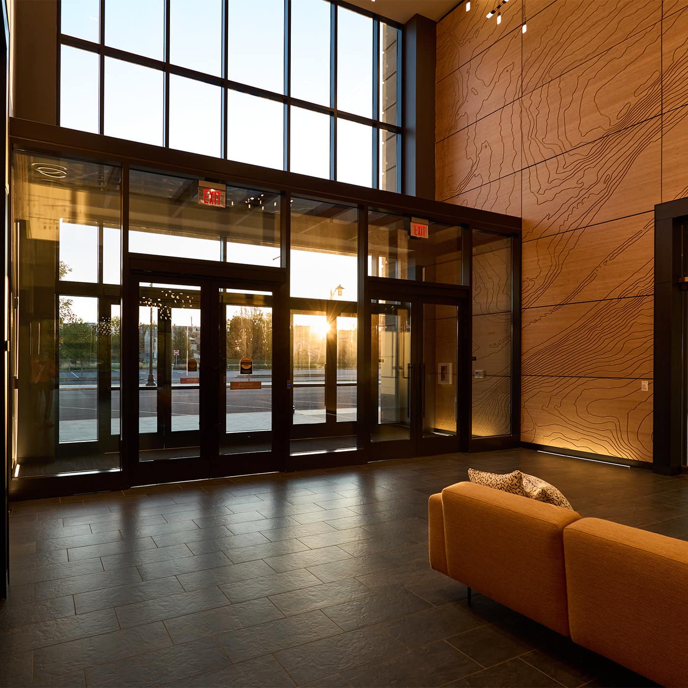 615 Waterfront lobby entryway at dusk.
