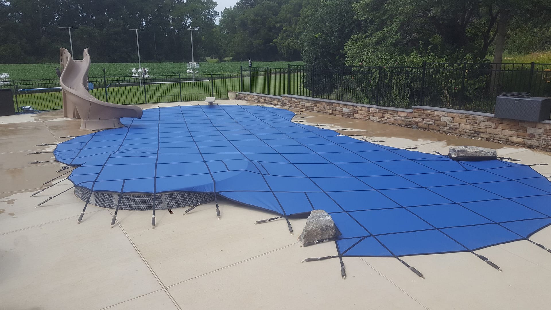 Custom-fit pool safety covers ensure reliable protection all winter long.