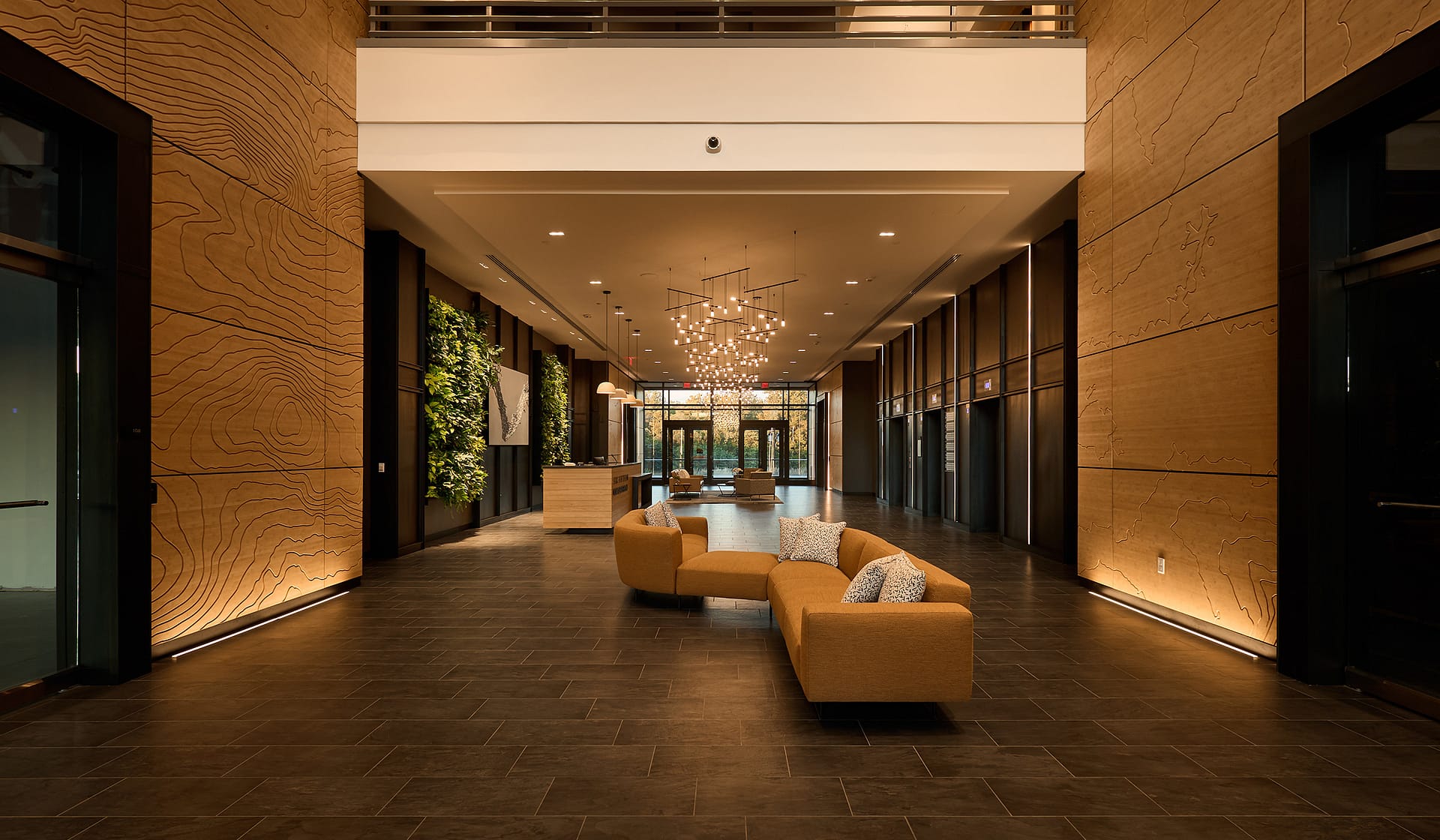 615 Waterfront lobby corridor with living green wall and city views in Allentown, Pennsylvania