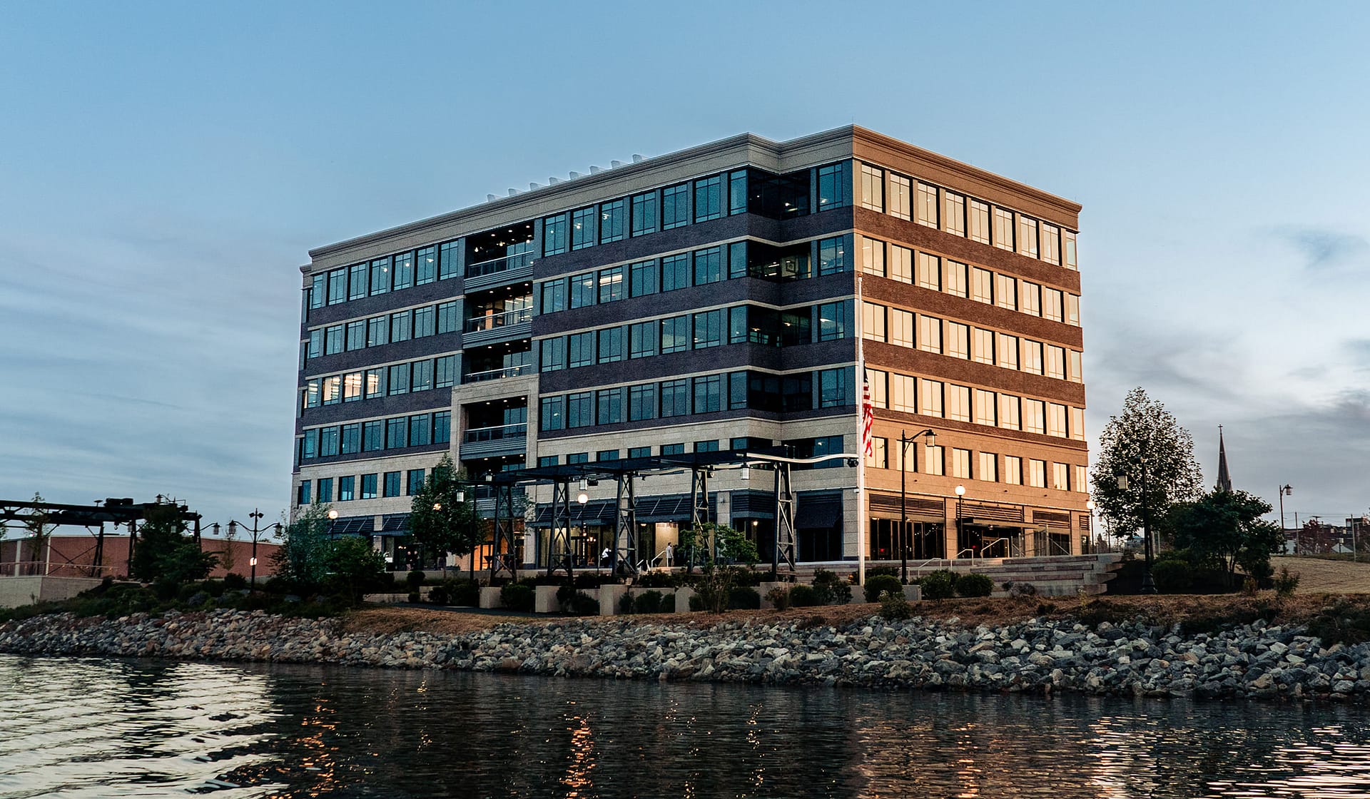 615 Waterfront office building at dusk along the Lehigh River