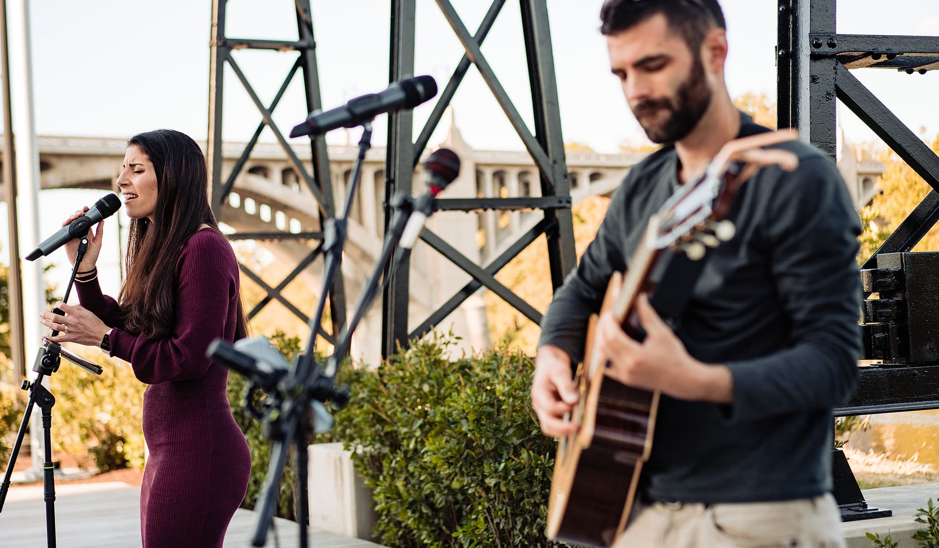 Musicians playing music at the South Amphitheater at The Waterfront in Allentown