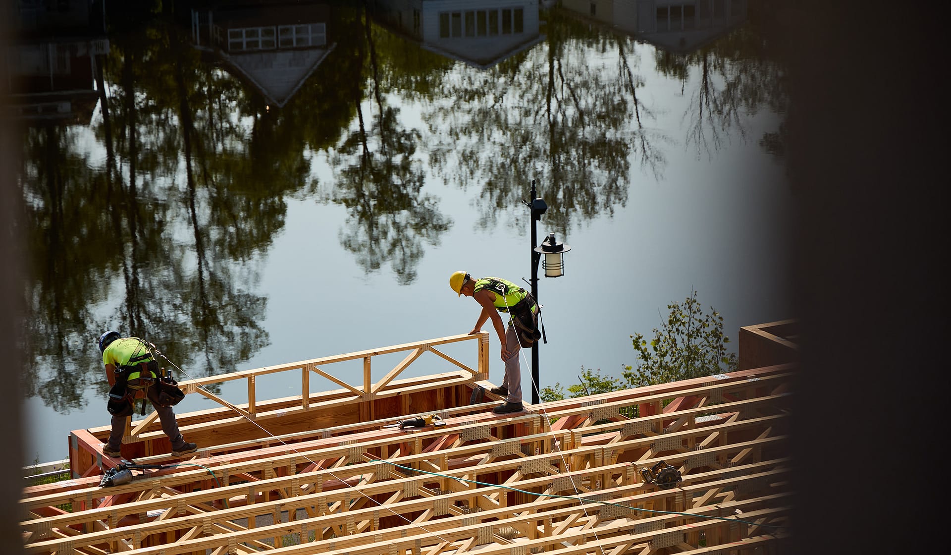 River House framing seen through trees across the Lehigh River